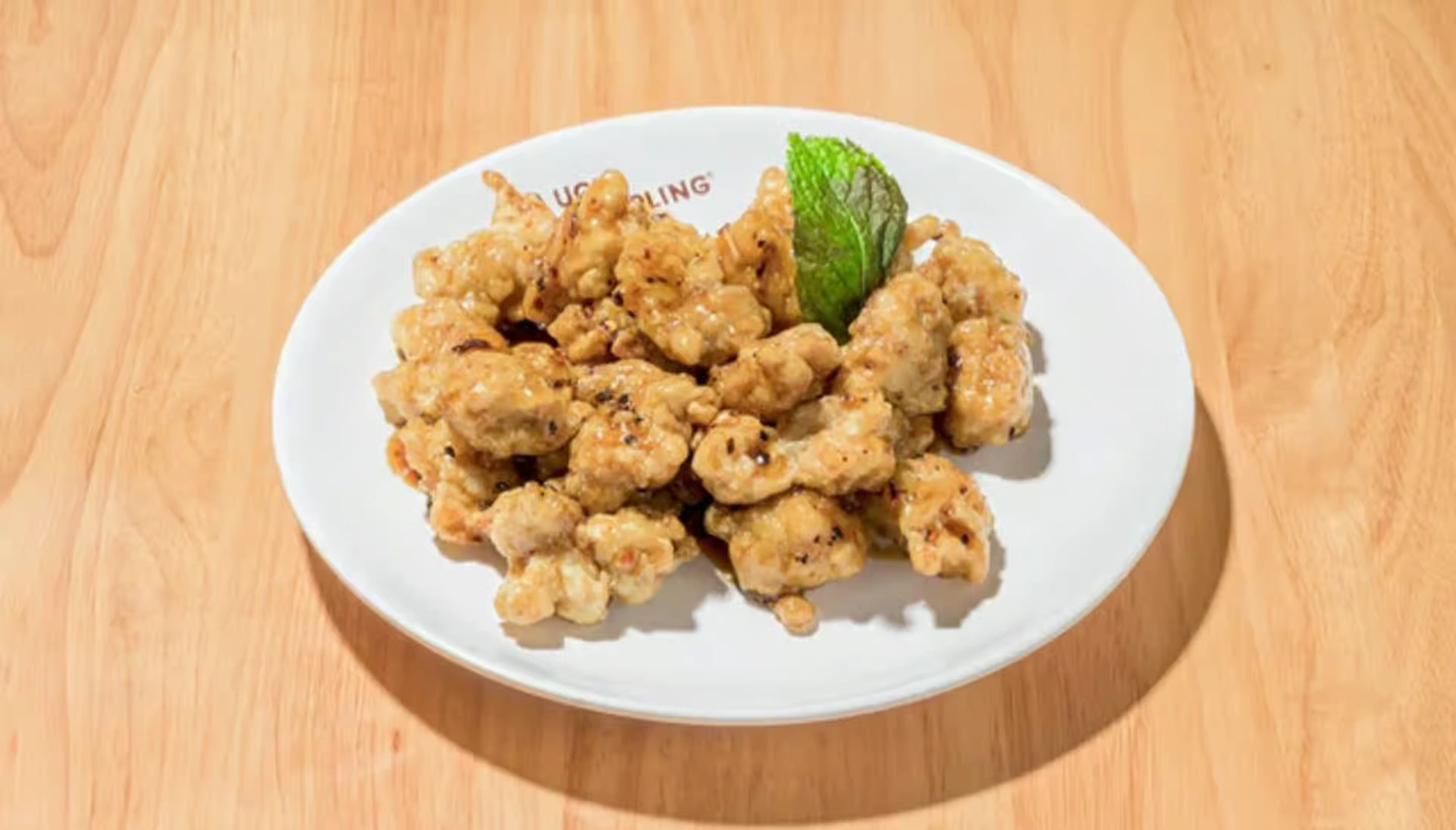 Orange chicken — crispy fried chicken in tangy orange glaze